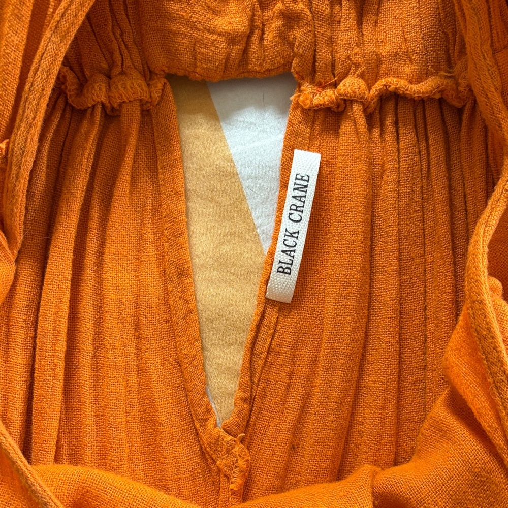 Black Crane orange sleeveless jumpsuit - Picture 3 of 5
